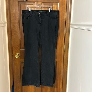 Black almost acid wash jeans.